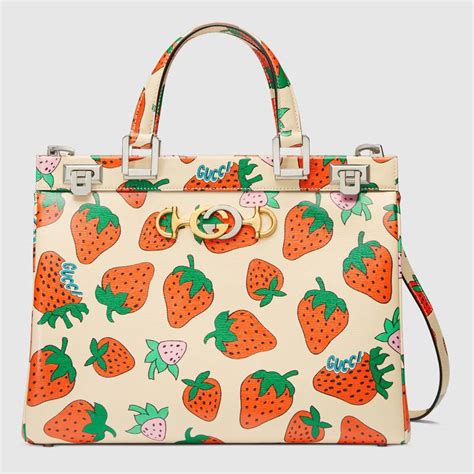 gucci strawberry purse|Gucci bag with strawberry charm.